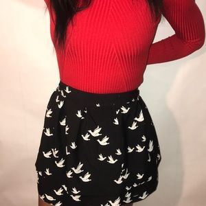 Black skirt with white bird pattern